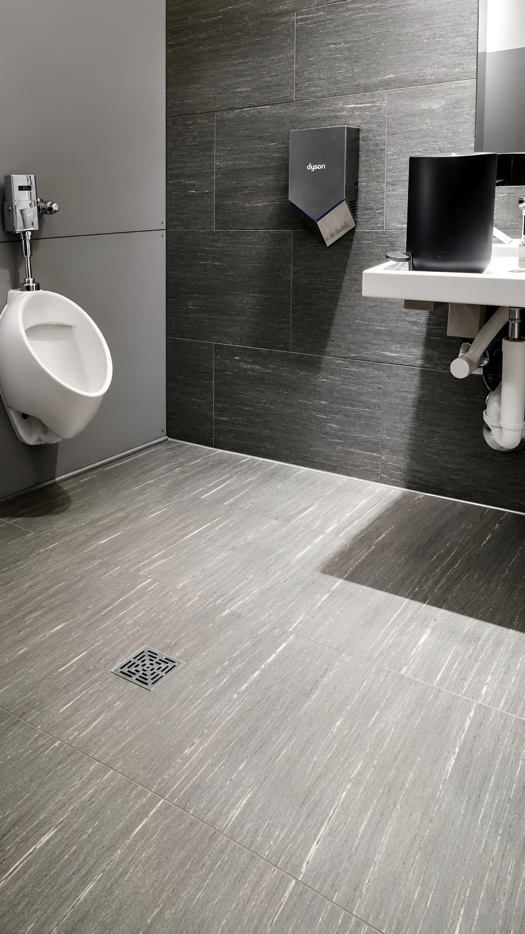 Restored commercial restroom cleaned by G&J Cleaning Services